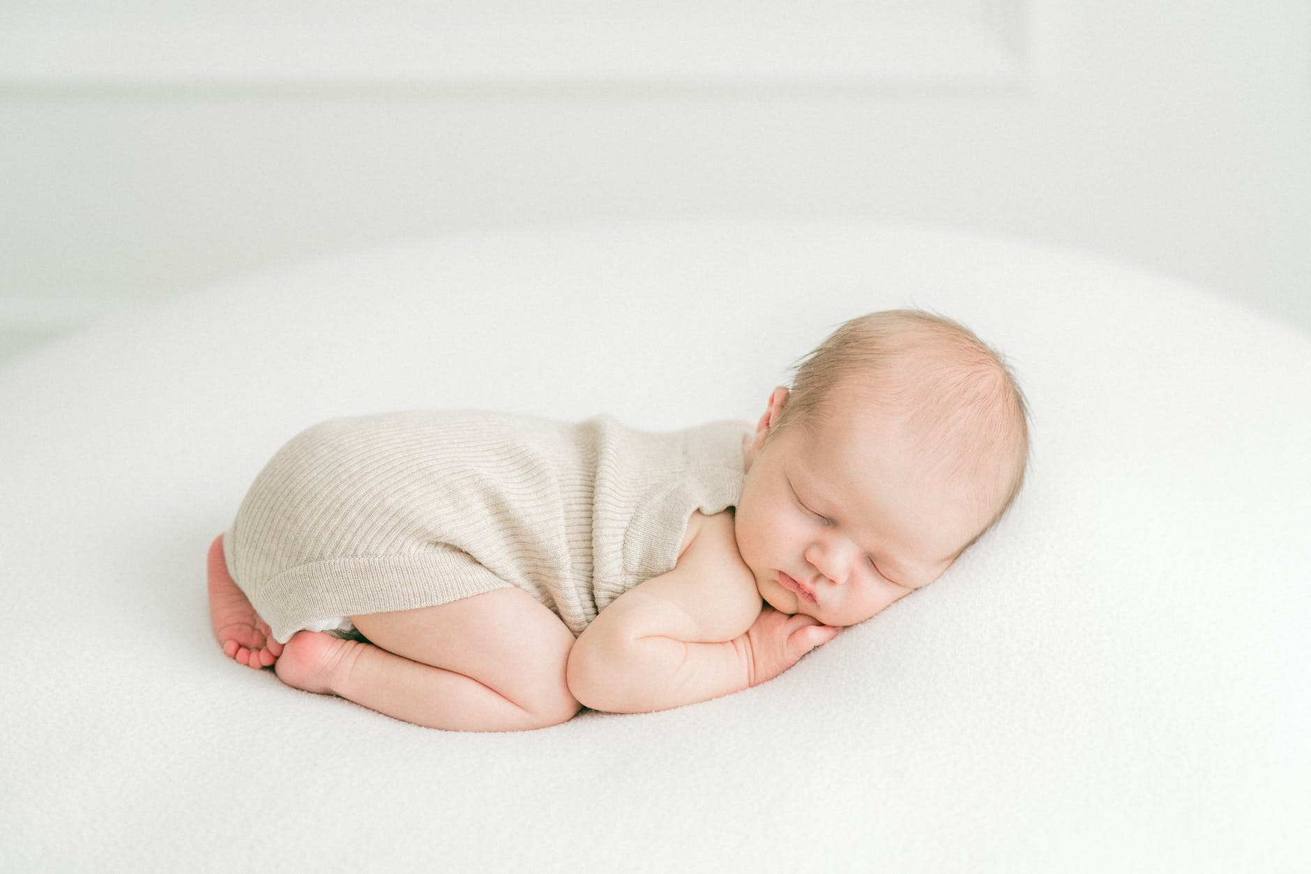 baby lying down and sleeping